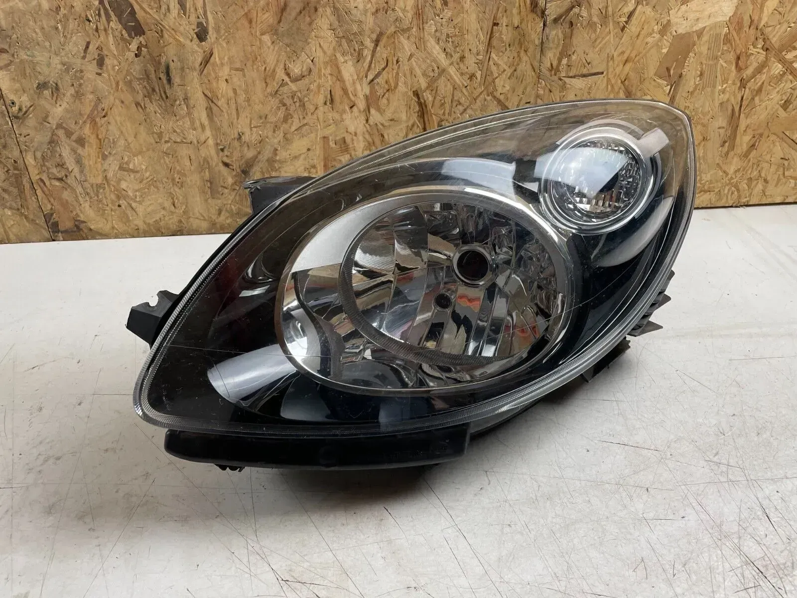 Renault Twingo II 1.2 16V Frontscheinwerfer Halogen links 271527-00 LI - Bild 1